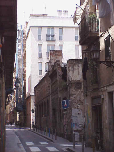 El Raval: the old and the new. A factory from the Industrial Revolution besides a new residential accommodation block